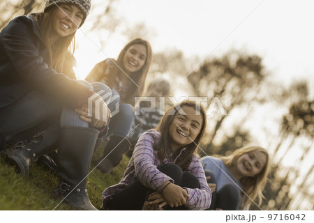 A large group of young children, girls and boys outdoors on a winter day, on an organic farm. A large group of young children, girls and boys outdoors on a winter day, on an organic farm. 9716042