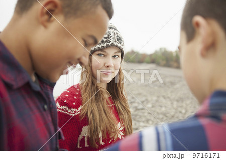 A day out at Ashokan lake. Three young people, teenagers, a girl and two boys.  9716171