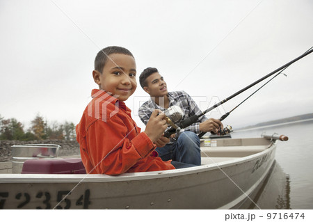 A day out at Ashokan lake. Two boys fishing from a boat.  9716474