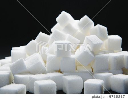 Pile of sugar cubes, black backdrop Pile of sugar cubes, black backdrop 9716817