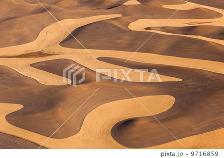 Farmland landscape, with ploughed fields and furrows in Palouse, Washington, USA. An aerial view with natural patterns. 9716859
