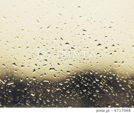 Rain water droplets on a window. View through the window on a rainy day. Seattle 9717068