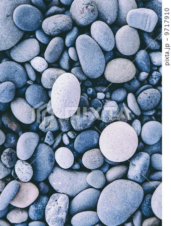 Polished smooth stones and pebbles on the sea shore, in Olympic national park. Varied shapes and sizes. Polished smooth stones and pebbles on the sea shore, in Olympic national park. Varied shapes and sizes. 9717910
