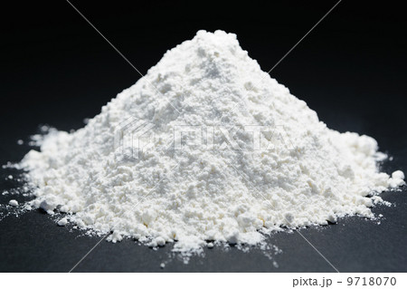 Pile of organic unbleached white flour, black backdrop Pile of organic unbleached white flour, black backdrop 9718070