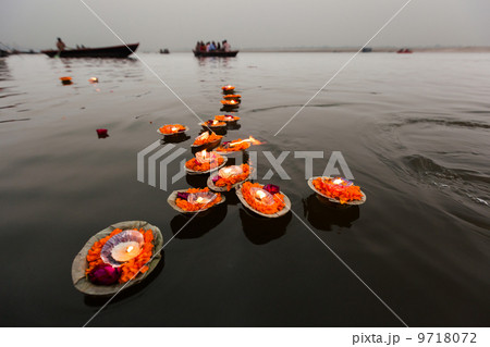 Candles floating in the Ganges River, Varanasi, India 9718072
