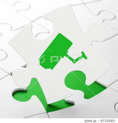 Protection concept: Cctv Camera on puzzle background 9720065