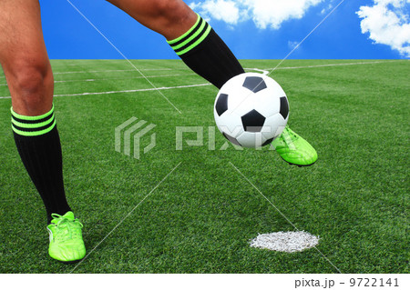 kicking soccer ball 9722141