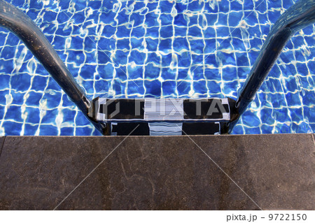 entrance to the swimming pool with metal railings entrance to the swimming pool with metal railings 9722150