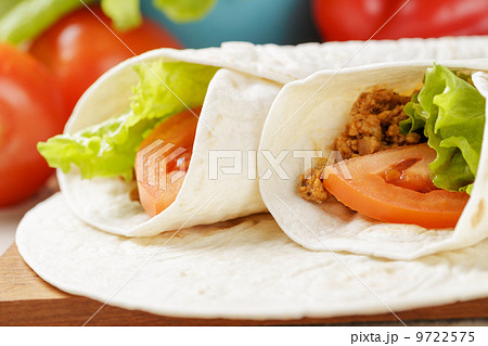 burritos with beef tomato and salad leaf 9722575