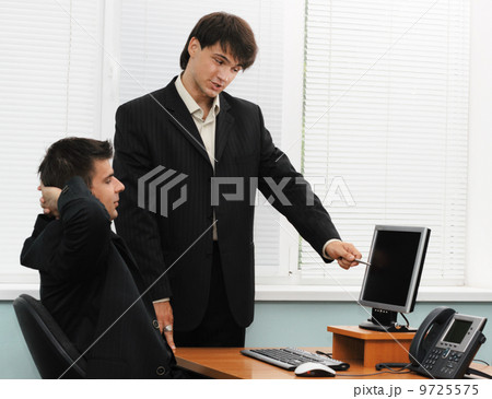 Two businessmen having a discussion Two businessmen having a discussion 9725575