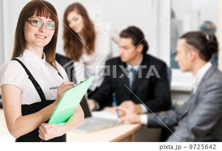 Office workers having a discussion Office workers having a discussion 9725642