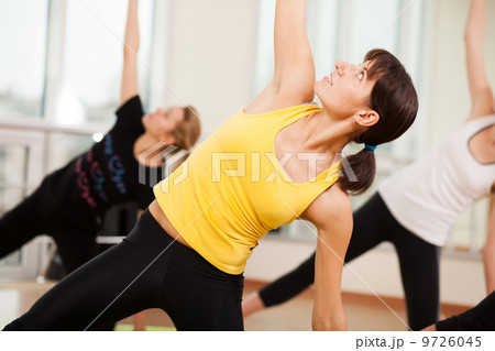 Group training in a fitness center Group training in a fitness center 9726045