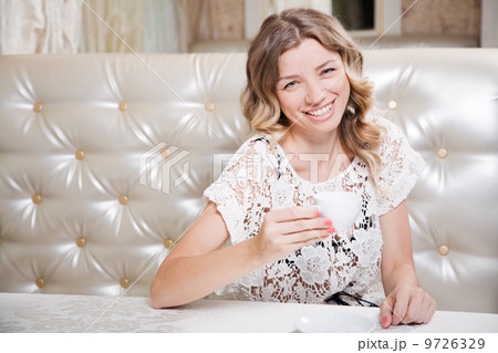 Beautiful lady in a restaurant Beautiful lady in a restaurant 9726329