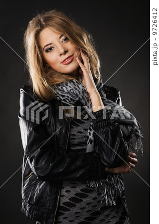 Pretty elegant woman in black leather jacket Pretty elegant woman in black leather jacket 9726412