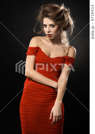 Gorgeous woman in a red dress Gorgeous woman in a red dress 9726413