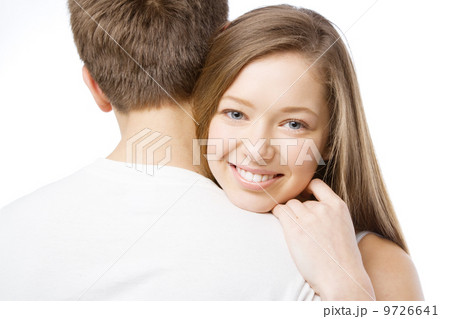Beautiful girl leaning on boyfriend's shoulder 9726641