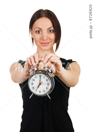 Beautiful young woman with vintage alarm clock Beautiful young woman with vintage alarm clock 9726920