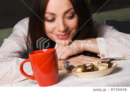 Beautiful lady drinking tea 9726948