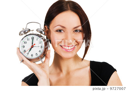 Cheerful woman with alarm clock 9727007