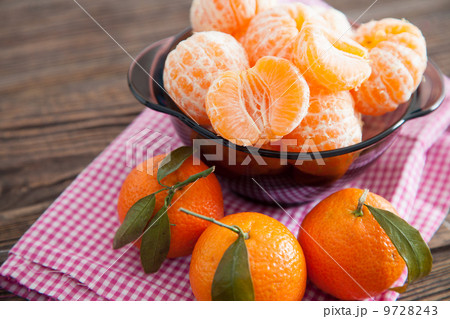 Peeled tangerines on a table Peeled tangerines on a table 9728243