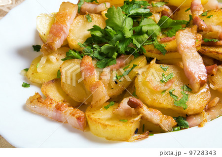 Fried potato with bacon 9728343