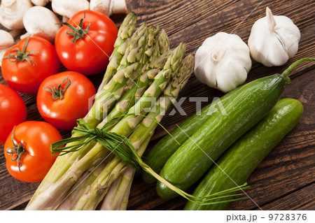 Fresh vegetables on a wooden table 9728376