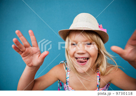 Playful cute young girl 9730118