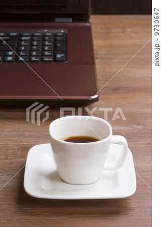 Espresso coffee with laptop 9730647