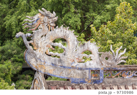Chinese dragon ornament on a rooftop 9730986