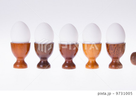 Set of different wooden egg cups Set of different wooden egg cups 9731005