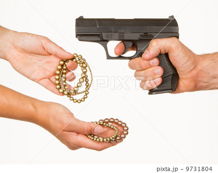 Man with knife threatening a woman 9731804