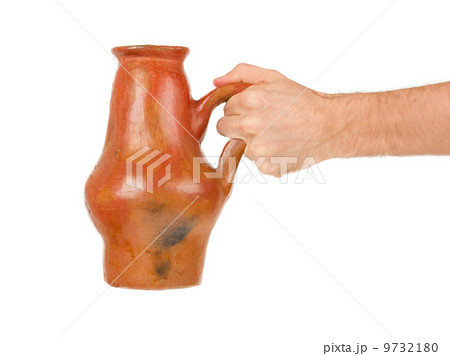 Man holding old earthen bowl Man holding old earthen bowl 9732180