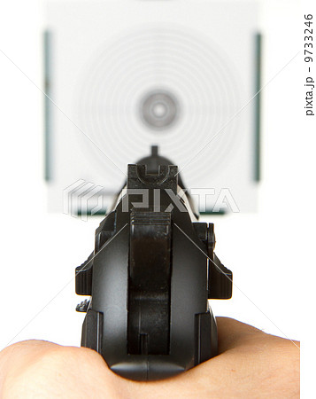 Handgun aimed on a shooting target Handgun aimed on a shooting target 9733246