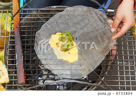 Rice paper meal being made on a barbeque Rice paper meal being made on a barbeque 9733804