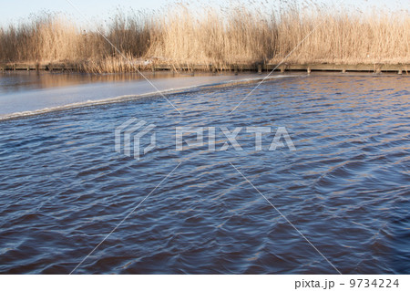 The waters are slowly freezing 9734224