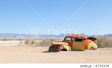 Abandoned car in the Namib Desert 9734326