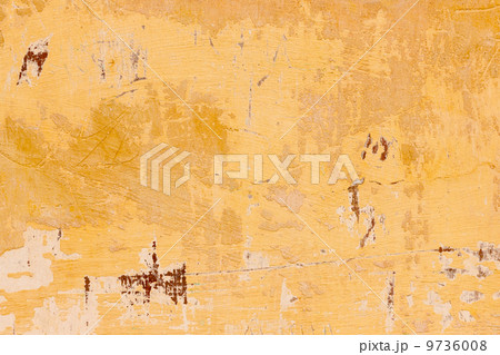 Badly damaged red plaster wall background Badly damaged red plaster wall background 9736008