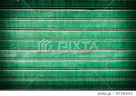 Green painted wooden background 9736443