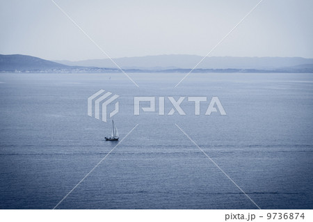 Lonely sailboa 9736874