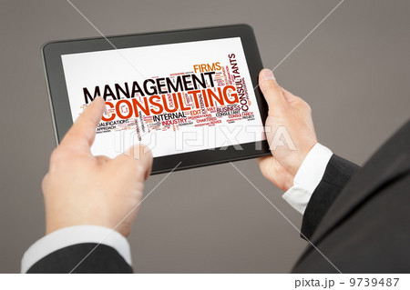 business man pointing to a tablet pc 9739487