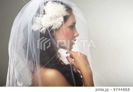 Engagement. Loveliness. Side view of Sincere Affectionate Woman in Veil 9744868