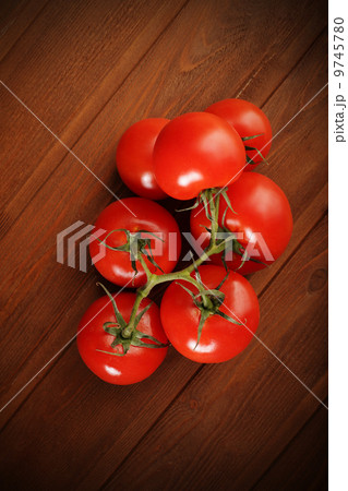 tomato on wood table 9745780