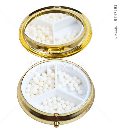 compact pill box with sugar homeopathy balls 9747293