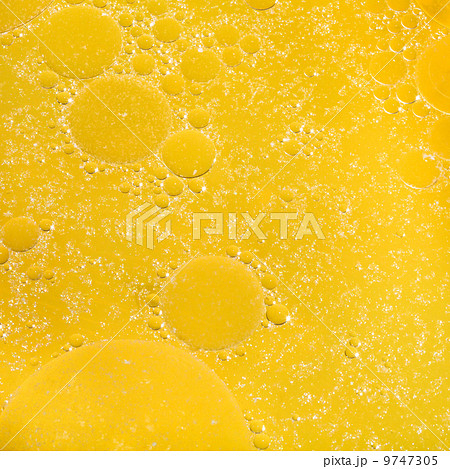 yellow surface of freshly brewed chicken broth 9747305
