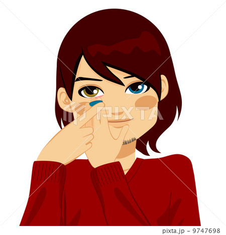 Man Applying Color Contact Lenses Man Applying Color Contact Lenses 9747698