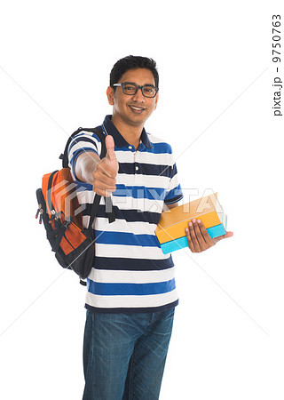 young indian college male with thumbs up 9750763