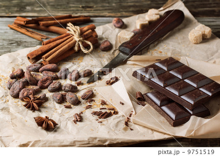 Dark chocolate with cocoa beans Dark chocolate with cocoa beans 9751519