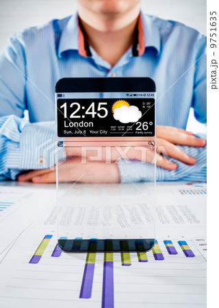 Smartphone with transparent screen in human hands. Smartphone with transparent screen in human hands. 9751635