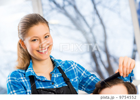 close portrait of a woman hairdresser close portrait of a woman hairdresser 9754552