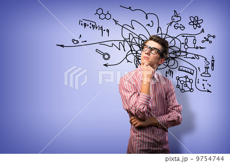 young man scientist with glasses thinking young man scientist with glasses thinking 9754744